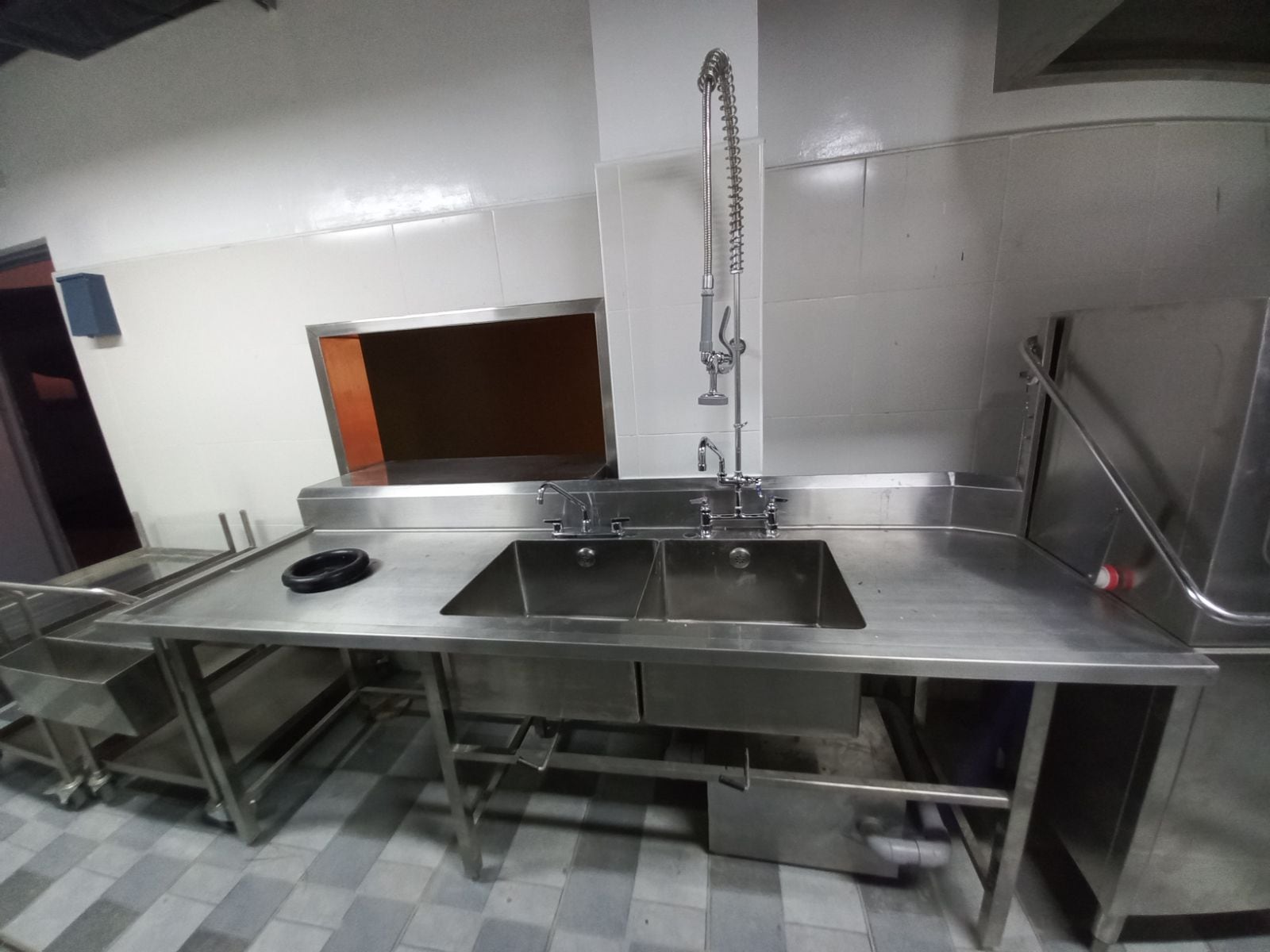 Hotel Van Gogh kitchen with stainless sinks, tables, and back-of-house equipment