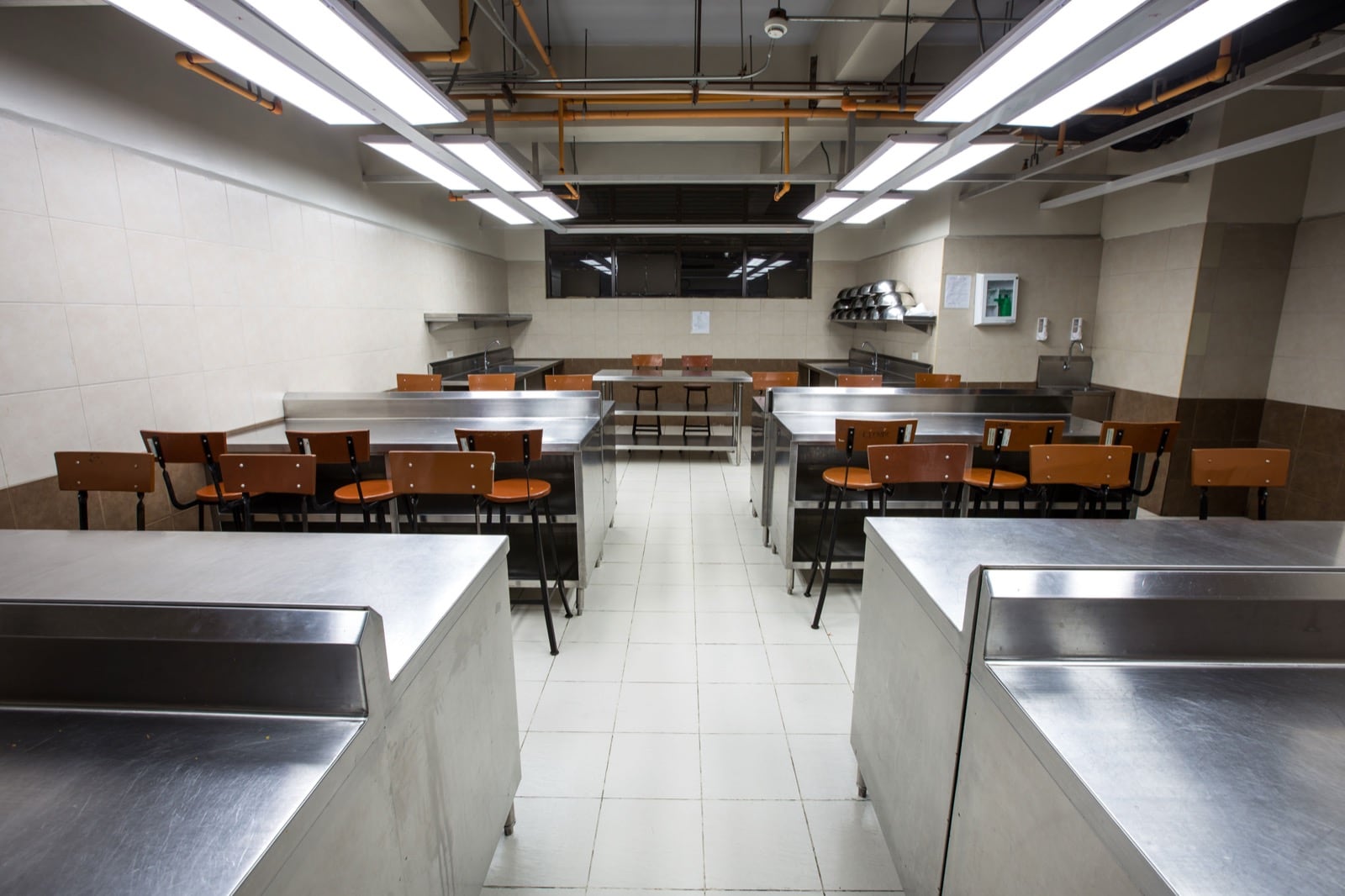 LPU culinary training kitchen with stainless tables and foodservice equipment