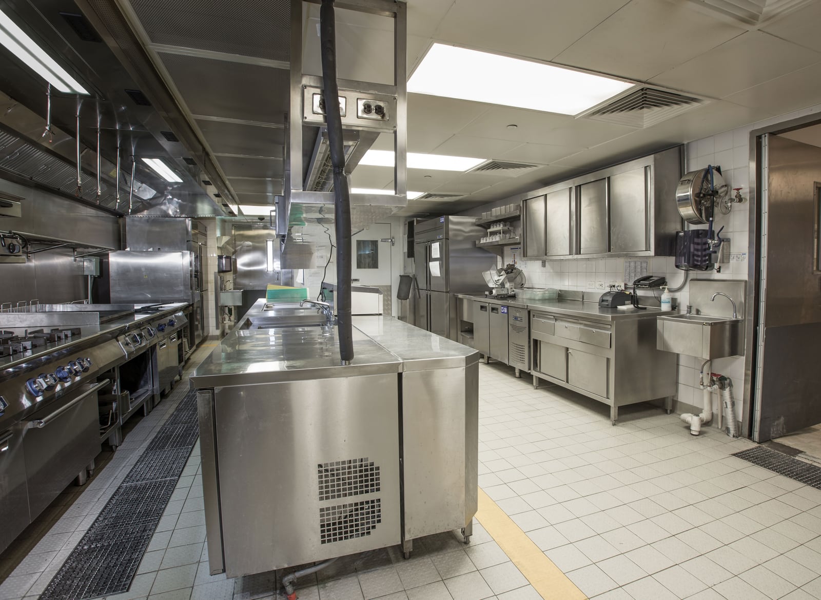 Marco Polo commercial kitchen with stainless equipment and work surfaces